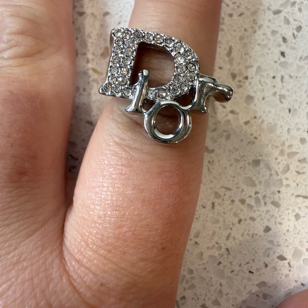 vintage Christian Dior silver-tone ring with a rhinestone cz-paved logo